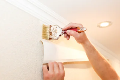 Pose de papier peint à Quenne — revêtements muraux et toiles de verre